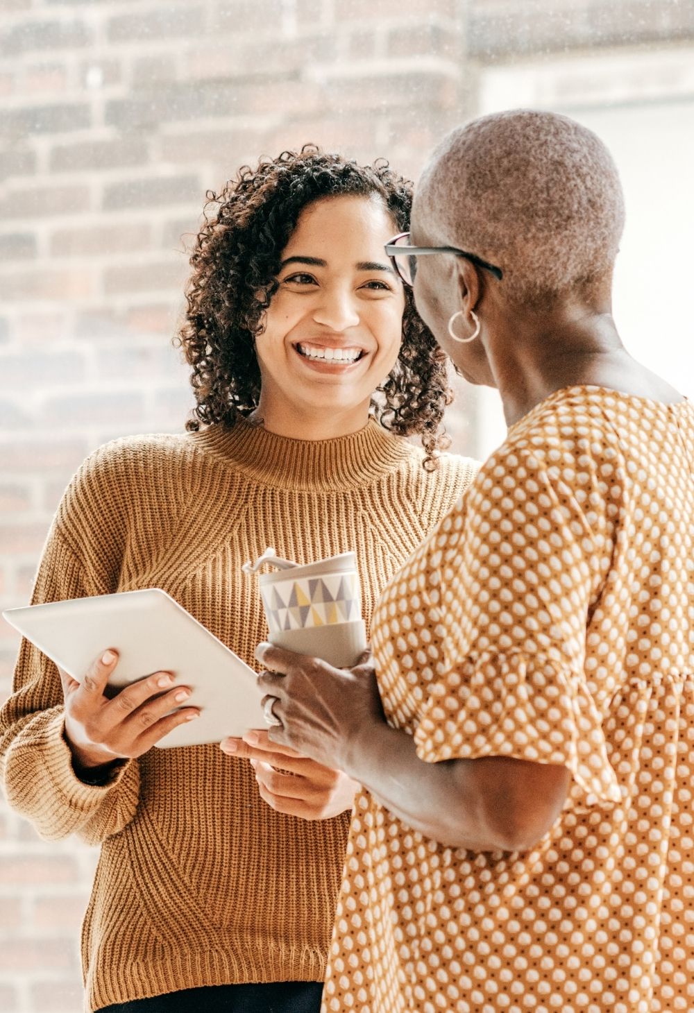 caregiver reading with senior