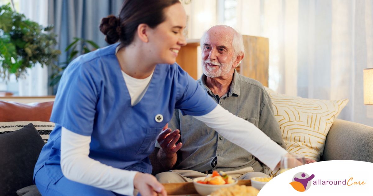 Caregiver providing senior care at home to manage parkinson’s and related symptoms.