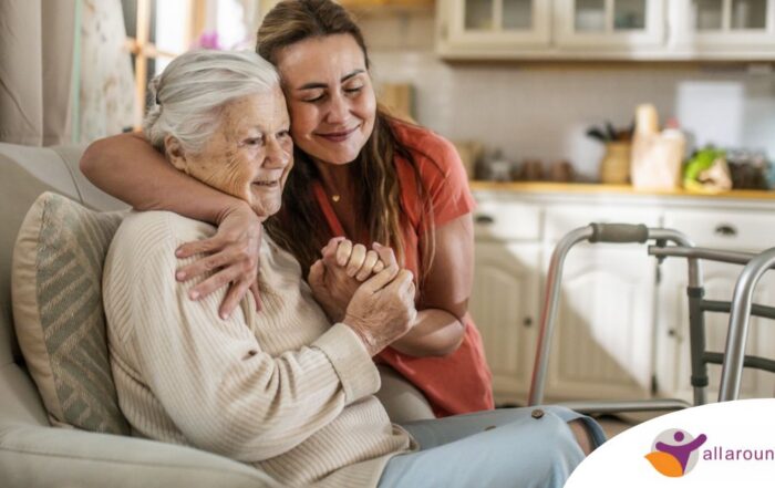 Caregiver supporting an elderly woman in the transition to senior home care