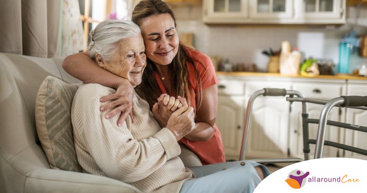 Caregiver supporting an elderly woman in the transition to senior home care