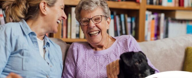 Through dementia care at home, a caregiver provides support to a senior.