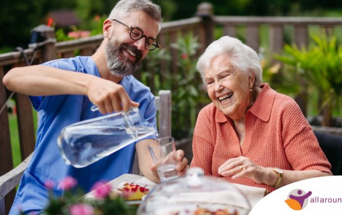 A caregiver applies summer Caregiving Tips including helping a senior stay hydrated.