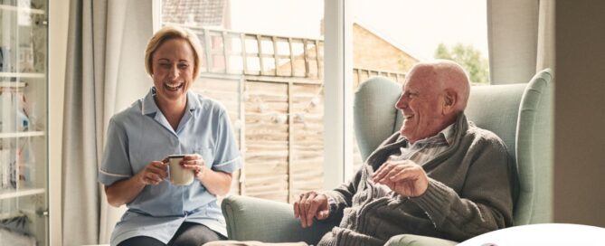 A caregiver provides Memory Care at Home to a senior